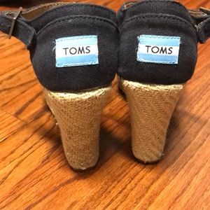 Black Toms sandals